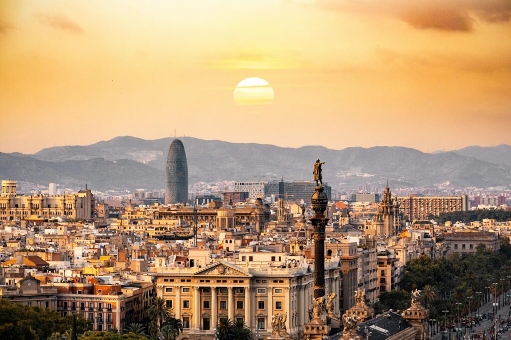 pexels-photo-1388030-1388030 A stunning sunset view of the Barcelona skyline showcasing iconic landmarks and a warm, golden hour glow.