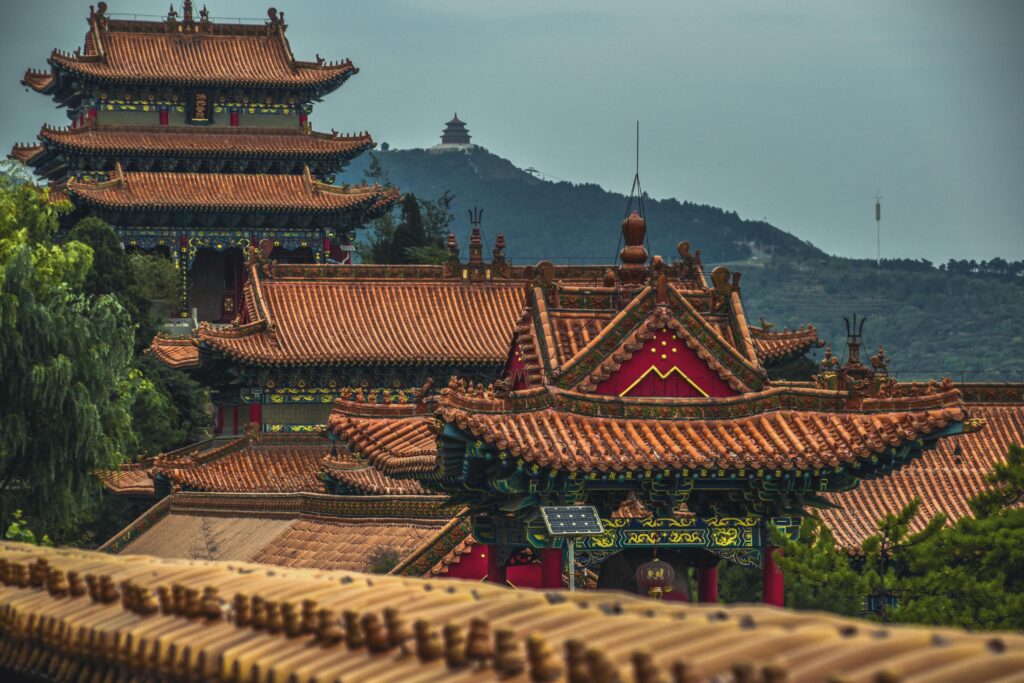 pexels-photo-2915957-2915957 Explore the stunning ancient architecture of a Chinese pagoda in Shanxi, featuring intricate roofs and lush surroundings.